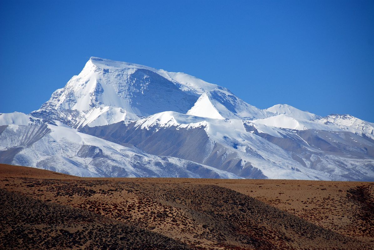 04 Gurla Mandhata From First View Of Mount Kailash Gurla Mandhata (7728m) shines to the south from the crest of the small hill for the first view of Mount Kailash.